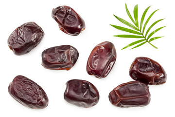 date fruits with green leaves isolated on white background. clipping path. top view