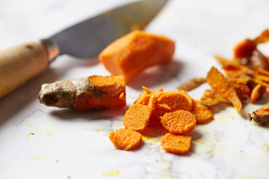 fresh turmeric roots on table