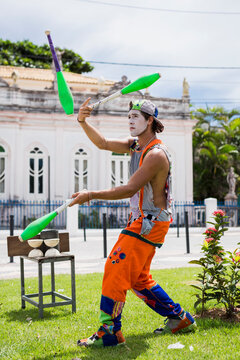 Circus performer juggling