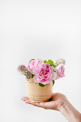 woman with nice flowers in the cup