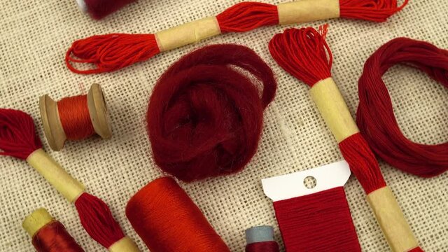 Red threads and yarns for sewing, embroidery and knitting, needlework 
