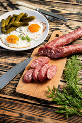 breakfast with egg, sausage and beans