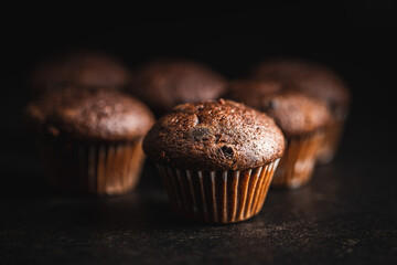 Chocolate muffins. Sweet dark cupcakes.