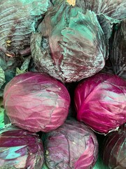 Fototapeta na wymiar Full frame shot of purple cabbages for sale at market.