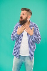 inspired bearded man in casual checkered shirt on blue background, inspiration