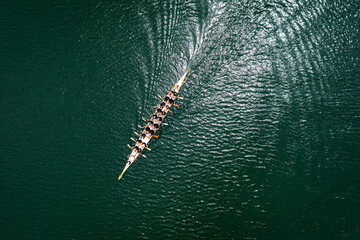 Top view of standard dragon boat on the lake - obrazy, fototapety, plakaty