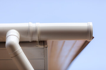 Gutter and pipe, roof drainage system.
