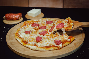 Pizza pepperoni with mozzarella cheese. Salami pizza.