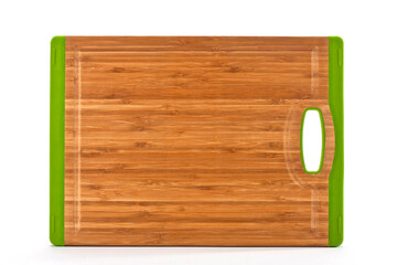 Wooden cutting board, kitchen utensil, with brown green plastic edges isolated on white background.