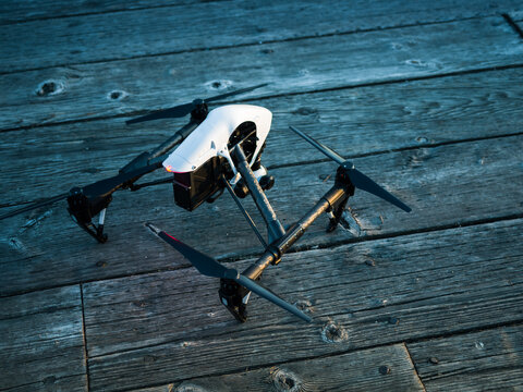 black drone isolated on wooden table