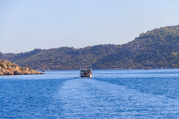 Tourist ship sailing in the Mediterranean sea near Kekova island in Antalya province, Turkey....