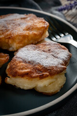 Homemade pancakes on a wooden table.