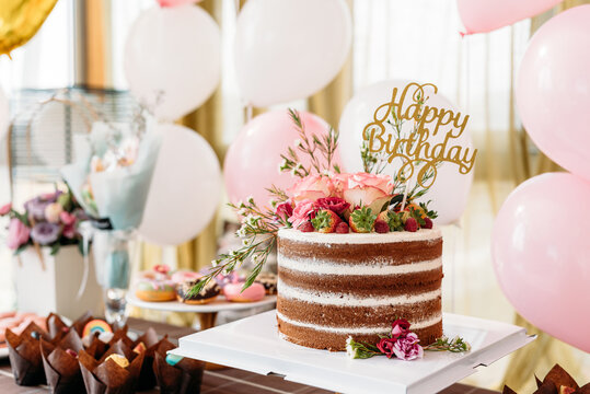 Multi layer cake on a dessert table
