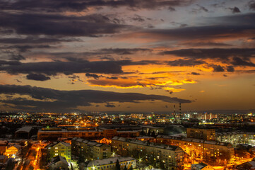 Fototapeta na wymiar Evening city background of beautiful sunset in Ukraine