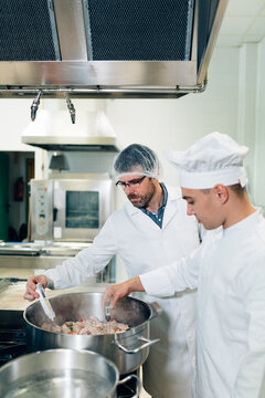 Chef and Quality Inspector checking the Food Temperature