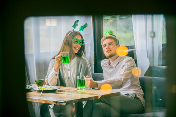 a couple young people celebrate St. Patrick's Day