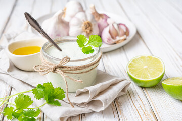 Cilantro garlic sauce with lime juice and olive oil