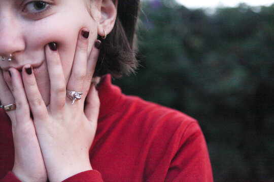 Shy Insecure Teen Girl With Hands On Face