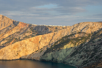 Fototapeta na wymiar Amazing cliffs seen during sunset on the island of Folegandros. Cyclades, Greece