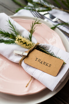 table decor for thanksgiving, with "thanks" in black ink