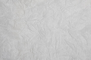 Old crumpled grey paper background texture