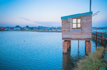 fisherman's house on the water