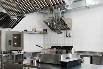 Utensils in professional restaurant kitchen