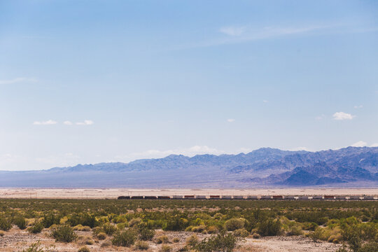 Train driving across the desert