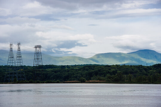 Catskill Mountains and utility poles across the Hudson River