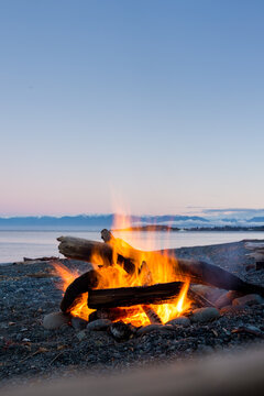 A long exposure of a beach fire after sunset