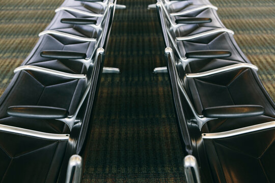 Row of modern airport lounge chairs