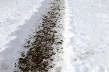 hiking trail in the snow in winter