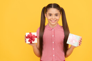 happy child girl showing gift and present box, happy birthday