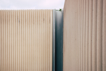 High concrete wall to isolate people.