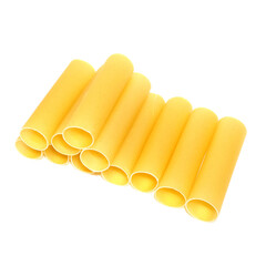 Yellow cannelloni pasta isolated on white background