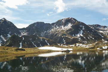 Ibon de Anayet and the Portalet with the bottom the Anayet peak. Concept famous mountains of the Aragonese Pyrenees
