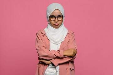 Obraz premium Portrait of unhappy beautiful Asian woman with folded hand