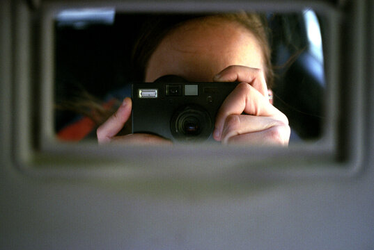 Self-portrait in the car