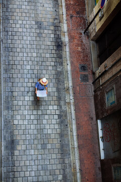 Woman doing tourism with map at Granada, Spain.