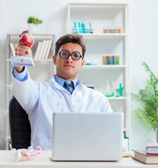 Funny doctor having fun in hospital lab