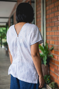 Asian woman wearing white cloth