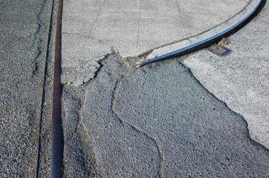 Merging Lines On Urban Sidewalk, Street And Railroad Tracks