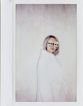 young woman with halloween sunglasses