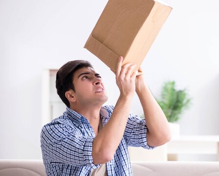 Man receiving empty parcel with stolen goods