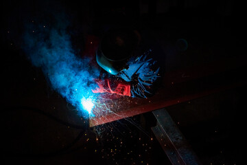 Welder in darkness