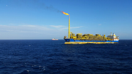 Offshore FPSO ship in production. Floating production, storage, and offloading. (FPSO).