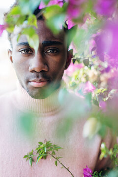 Portrait of a black man looking at camera.