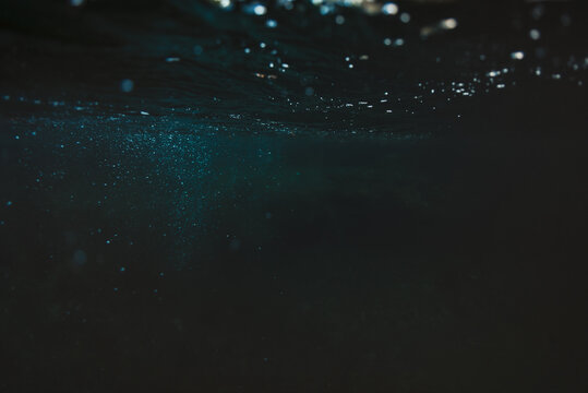 Dark and Spooky Underwater With Bubbles
