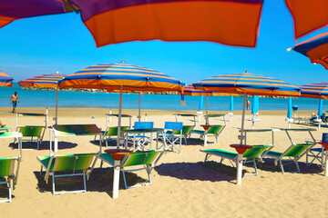 beach chairs and umbrellas