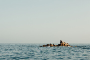 Group of rocks in the middle of the sea